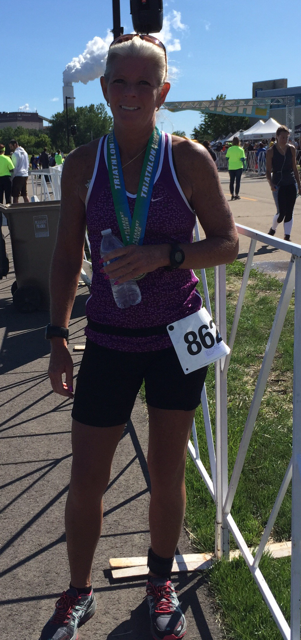 woman smiling after finishing marathon